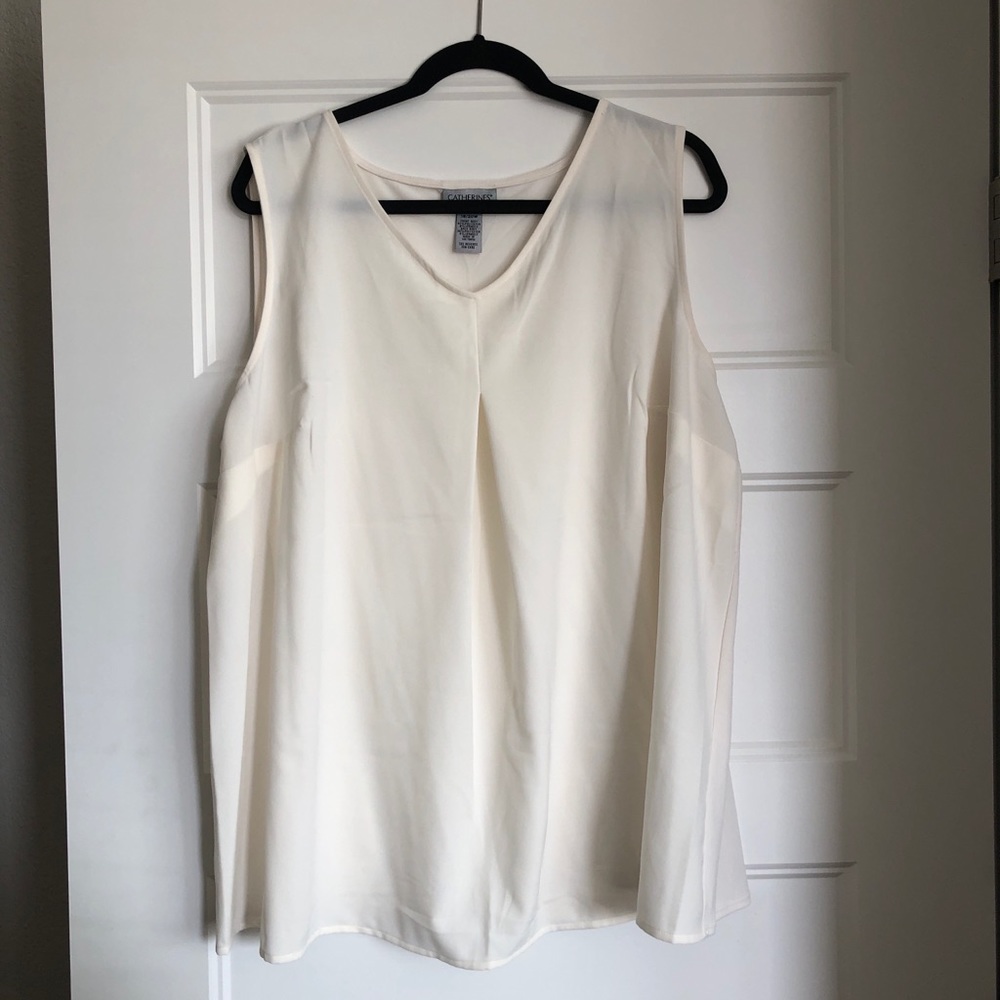 Sleeveless white blouse